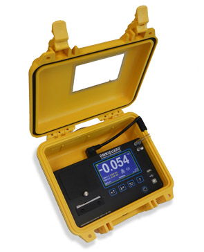 A yellow case with a black electronic device inside of it.