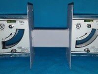 A pair of meters sitting on top of each other.