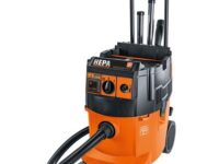 A vacuum cleaner with wheels and handles on it.