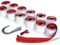 A group of red and white tape with scissors.