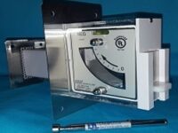 A close up of an electronic device on top of a table.