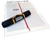 A white tarp with red and black stripes on it.