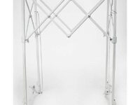 A white metal frame with a large folding screen.