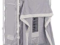 A portable shower tent with a door open.