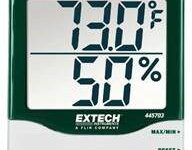 A digital thermometer is shown with the temperature and humidity displayed.