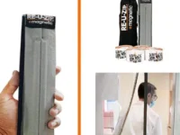 A person holding onto the handle of a stick