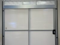 A white door with two windows and one glass pane.