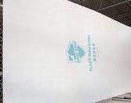 A large white sheet of paper on top of a table.